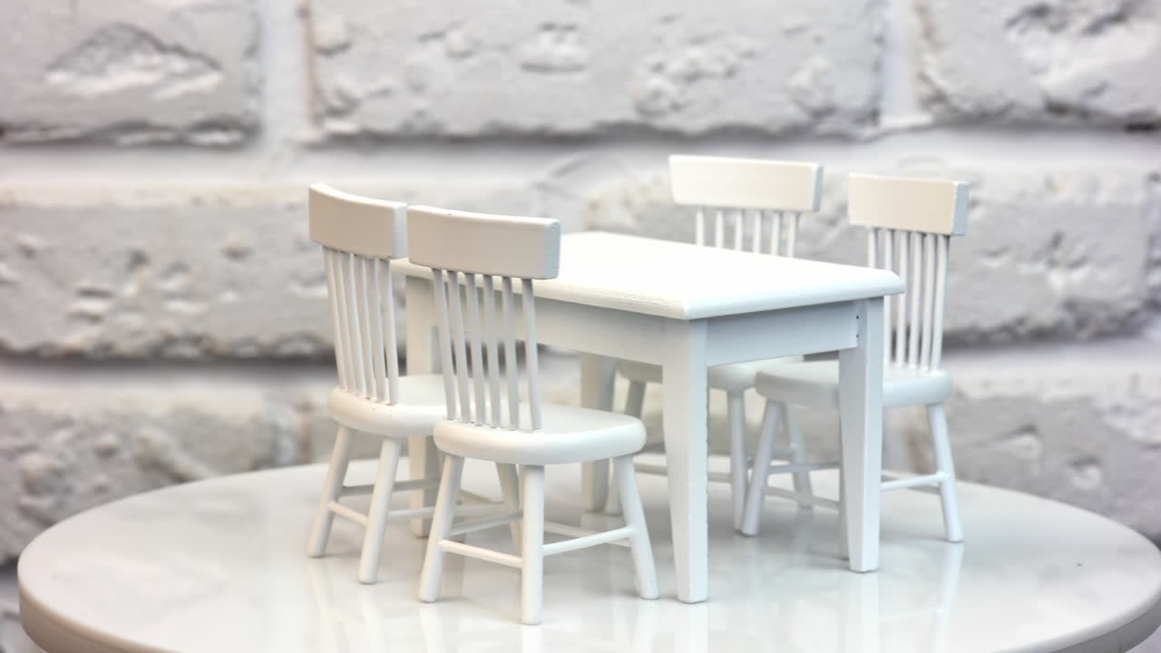 Furniture for dolls and dollhouse. Close up of toy wooden furniture, rotation