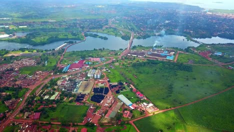 aerial view of nile breweries and jinja nile bridge on white nile river in uganda