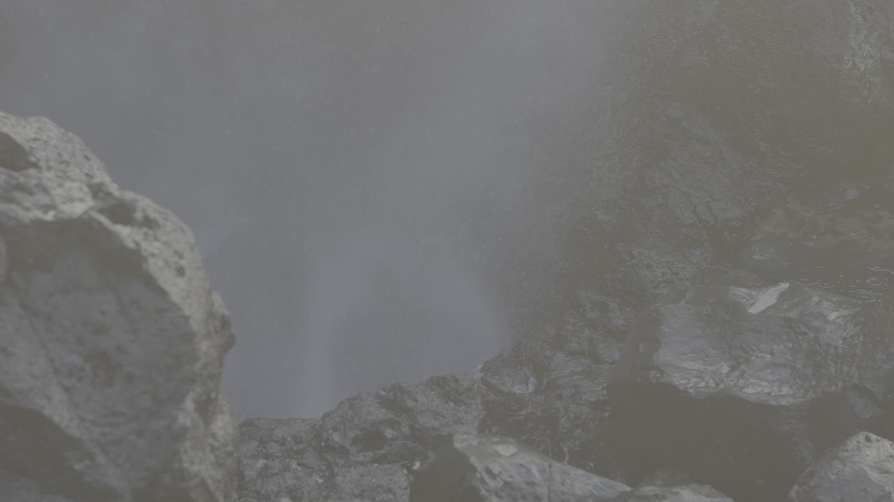 Waterfall Splashing Over Rocks