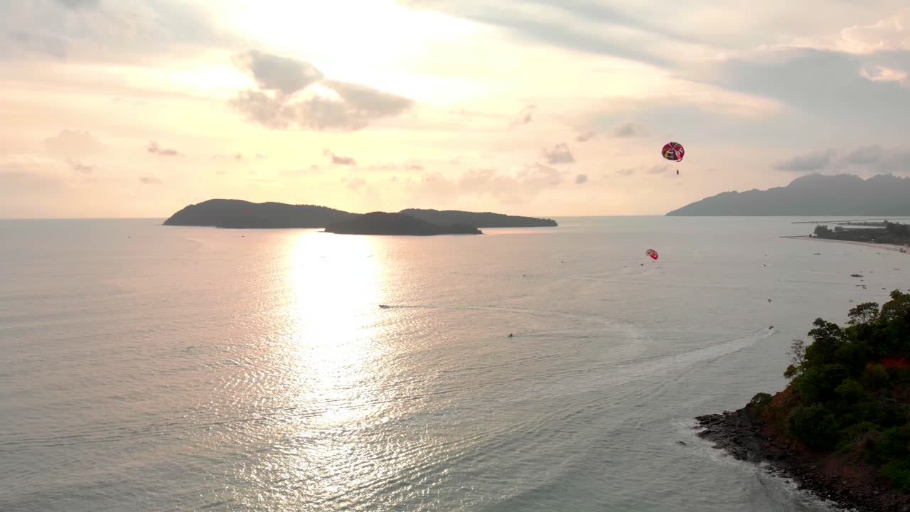 Parasailing over ocean outside Langkawi