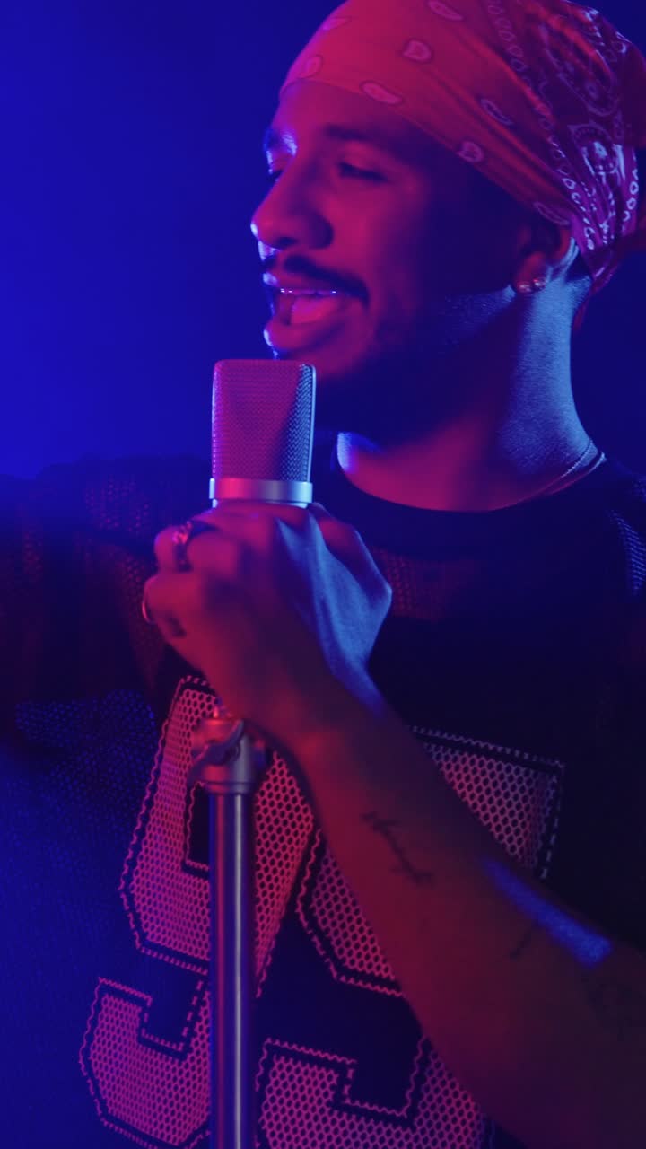 Man singing into a microphone