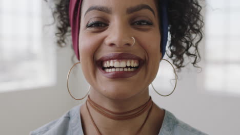 close-up-portrait-of-young-independent-hispanic-woman-laughing-cheerful-proud-enjoying-successful-lifestyle-change-in-new-apartment