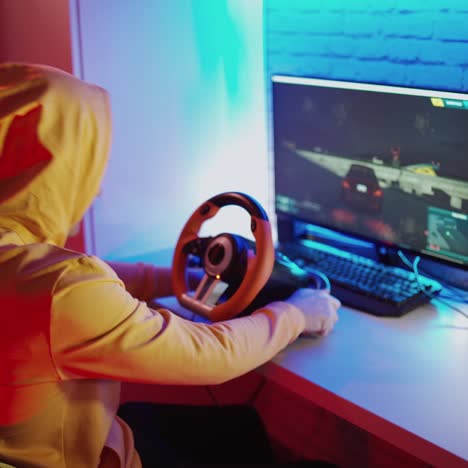 young man playing car racing