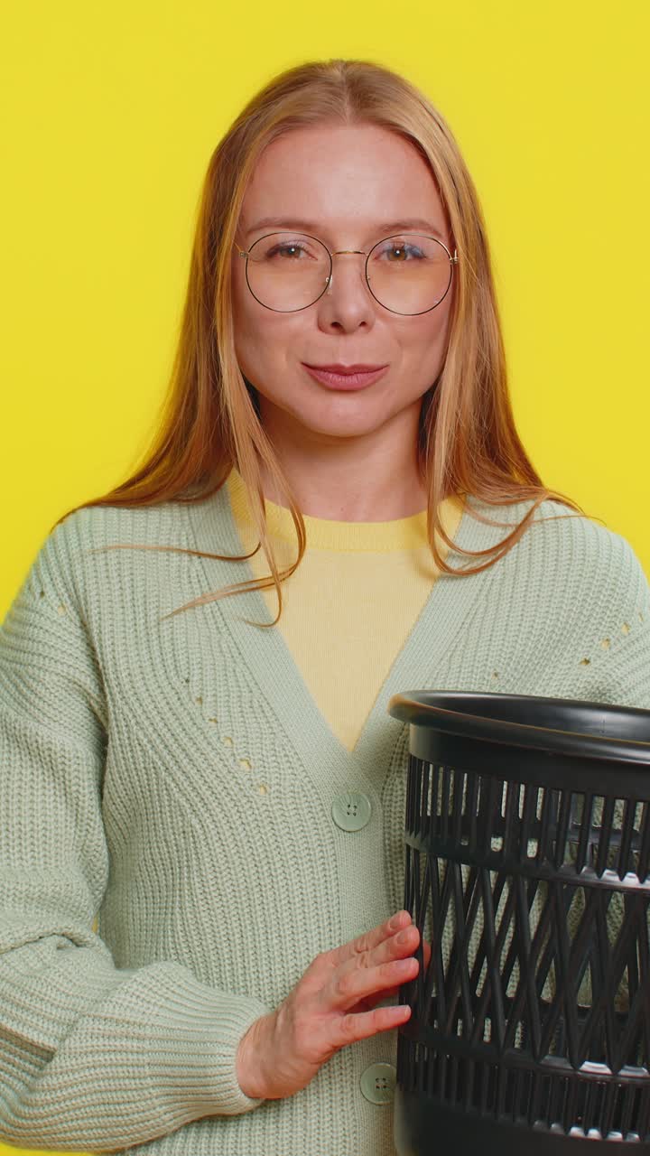 Woman taking off throwing out glasses into bin after medical vision laser treatment therapy surgery