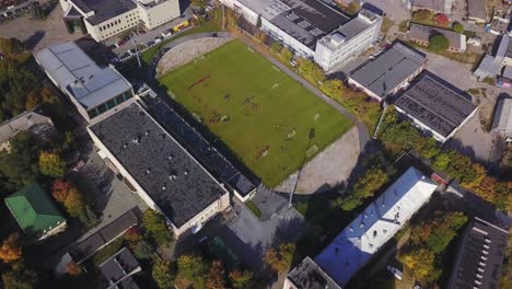 aerial view of a soccer game in a city stadium