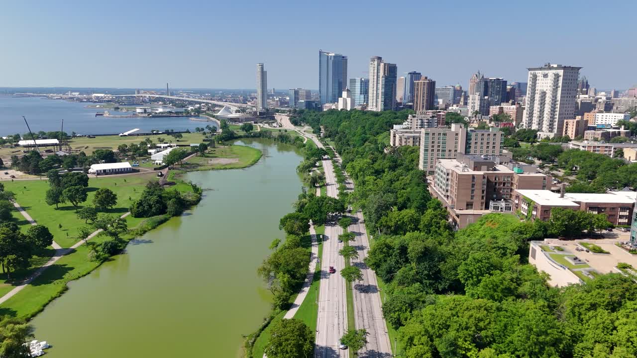 Aerial view of the Milwaukee WI lakefront featuring the downtown skyline, McKinnley Park lagoon the art museum and the Hoan bridge