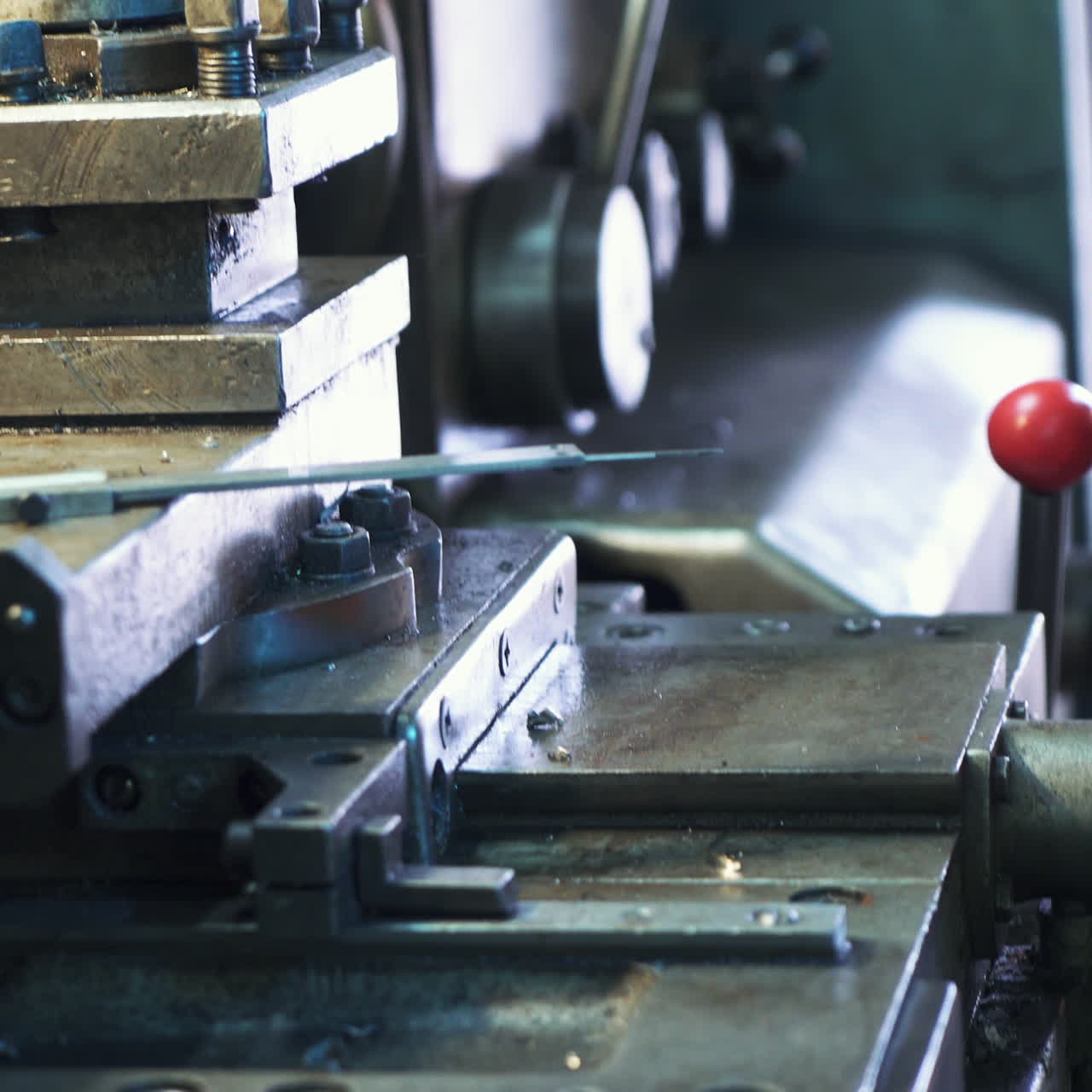 Modern lathe-cutting machine with manual control. Metalworking equipment.