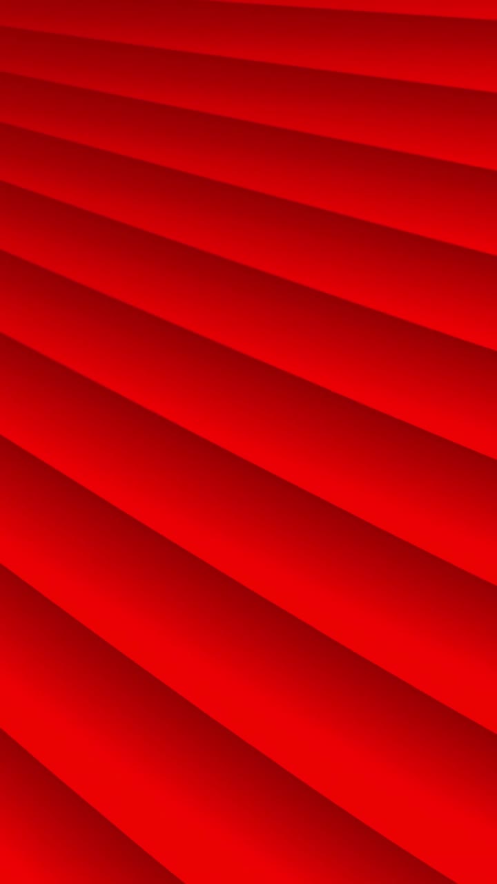 A vibrant red background with an elegant, immersive depth effect.