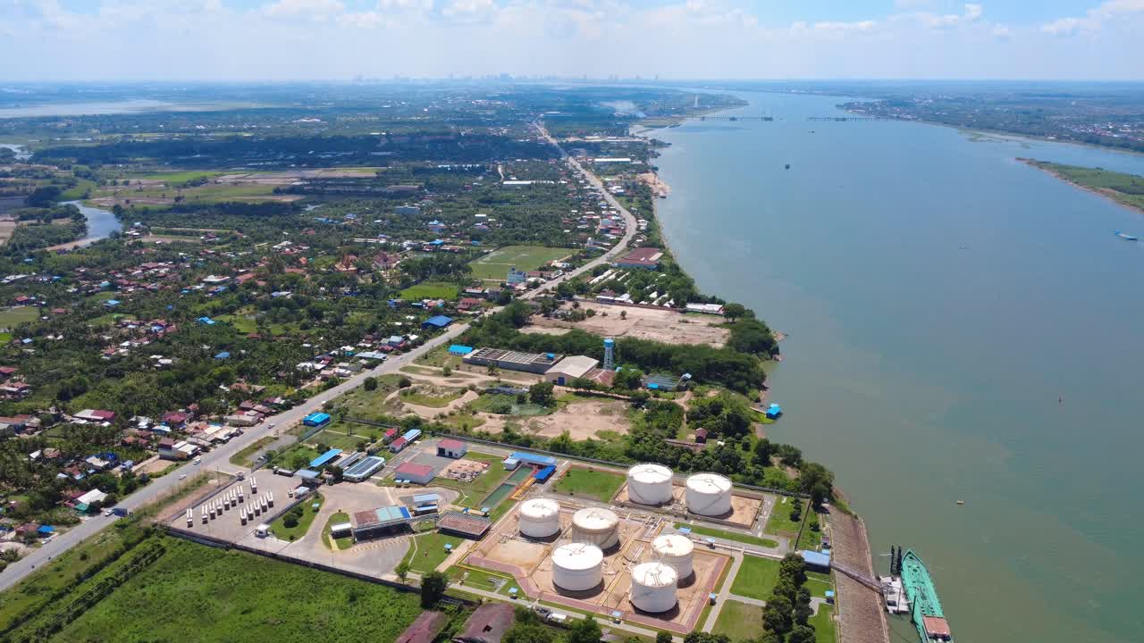 Crude oil gas refinery industrial plant on mekong river Cambodia Southeast Asia