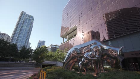 shiny panda sculpture in front of jw marriot parq vancouver hotel; parallax