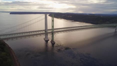 wide establishing drone shot of the tacoma narrows bridge, circa 2015