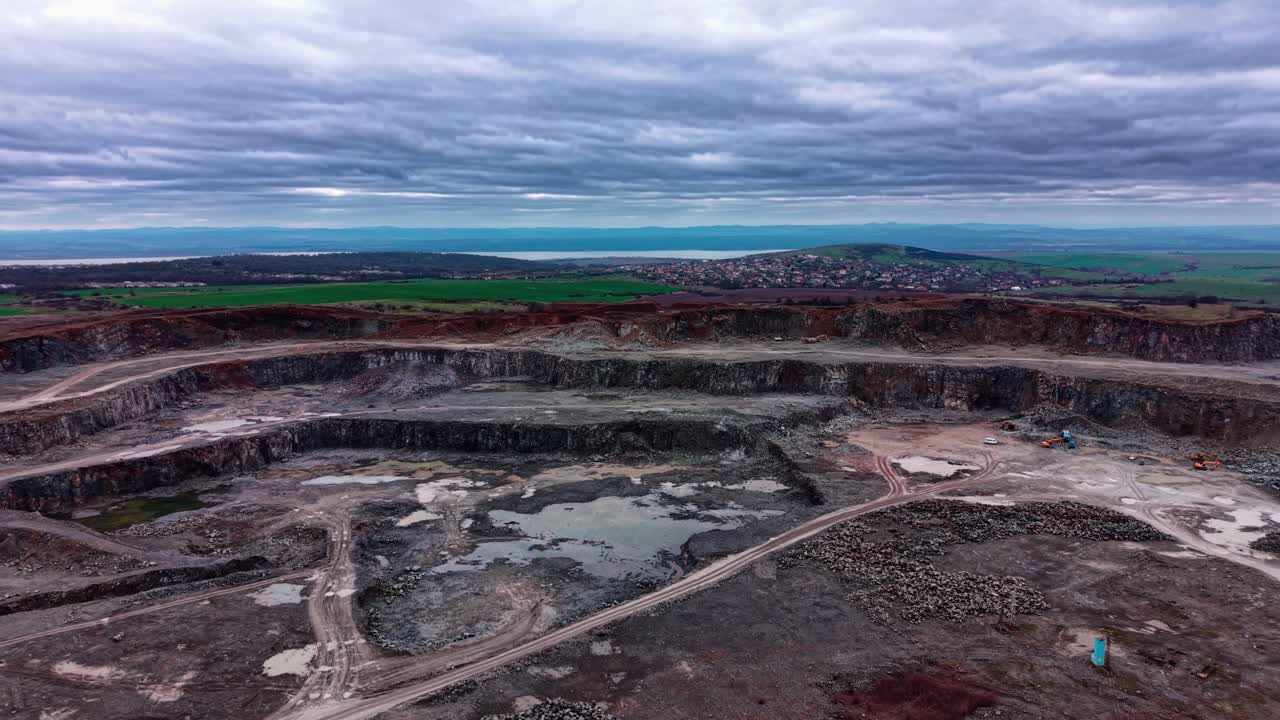 Quarry site showing granite extraction activity in rural area