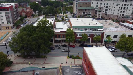 a drone shot of a street in downtown greenville south carolina