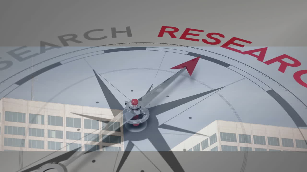 Compass needle pointing towards RESEARCH on building facade with animation graphics