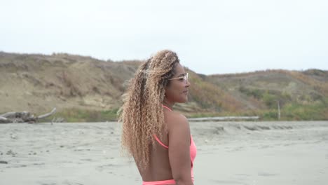 Beautiful-latina-girl-walking-over-the-beach