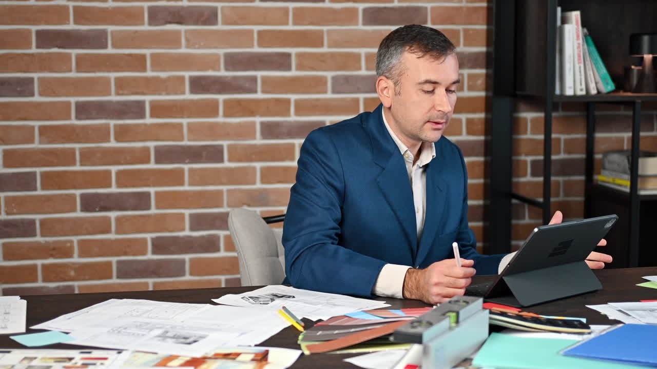 Man talking on a web conference at an office