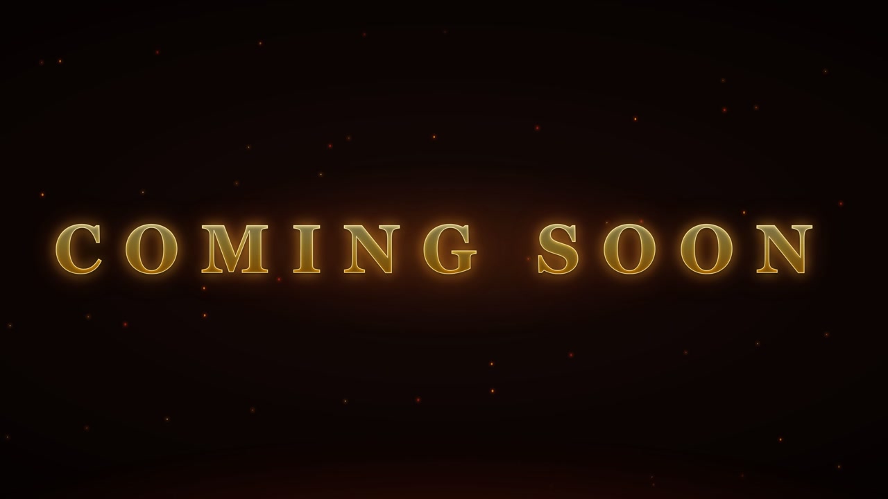 Animazione testuale "Coming Soon" con particelle fluttuanti