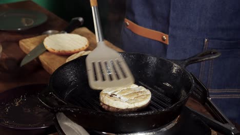 cooking a gourmet burger with cheese