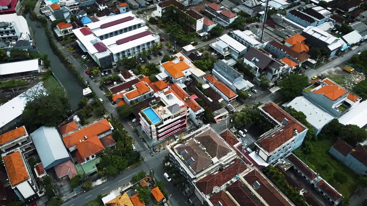 Wonderful Denpasar city drone with houses and rice field footage in Bali. This footage was shot during Covid-19 pandemic in Indonesia