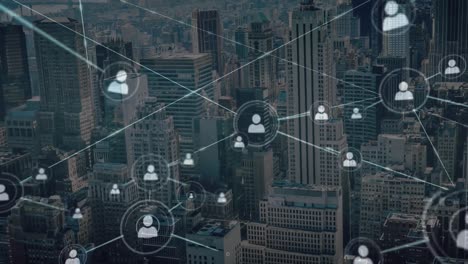 animation of profile icons connected with lines over aerial view of modern city