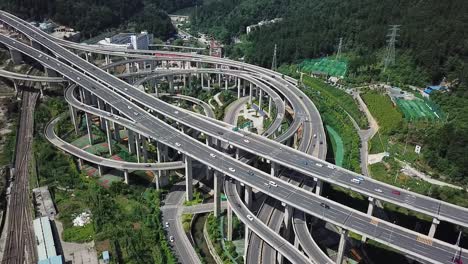 daytime highway aerial of a big interchange bridge of chongqing, huangjuewan, china