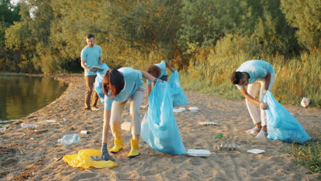 community volunteers cleaning up a riverbank