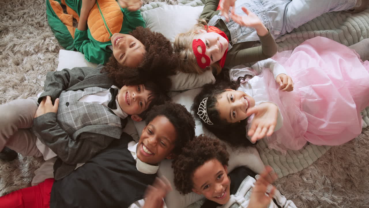 Children in Costumes Celebrating Together