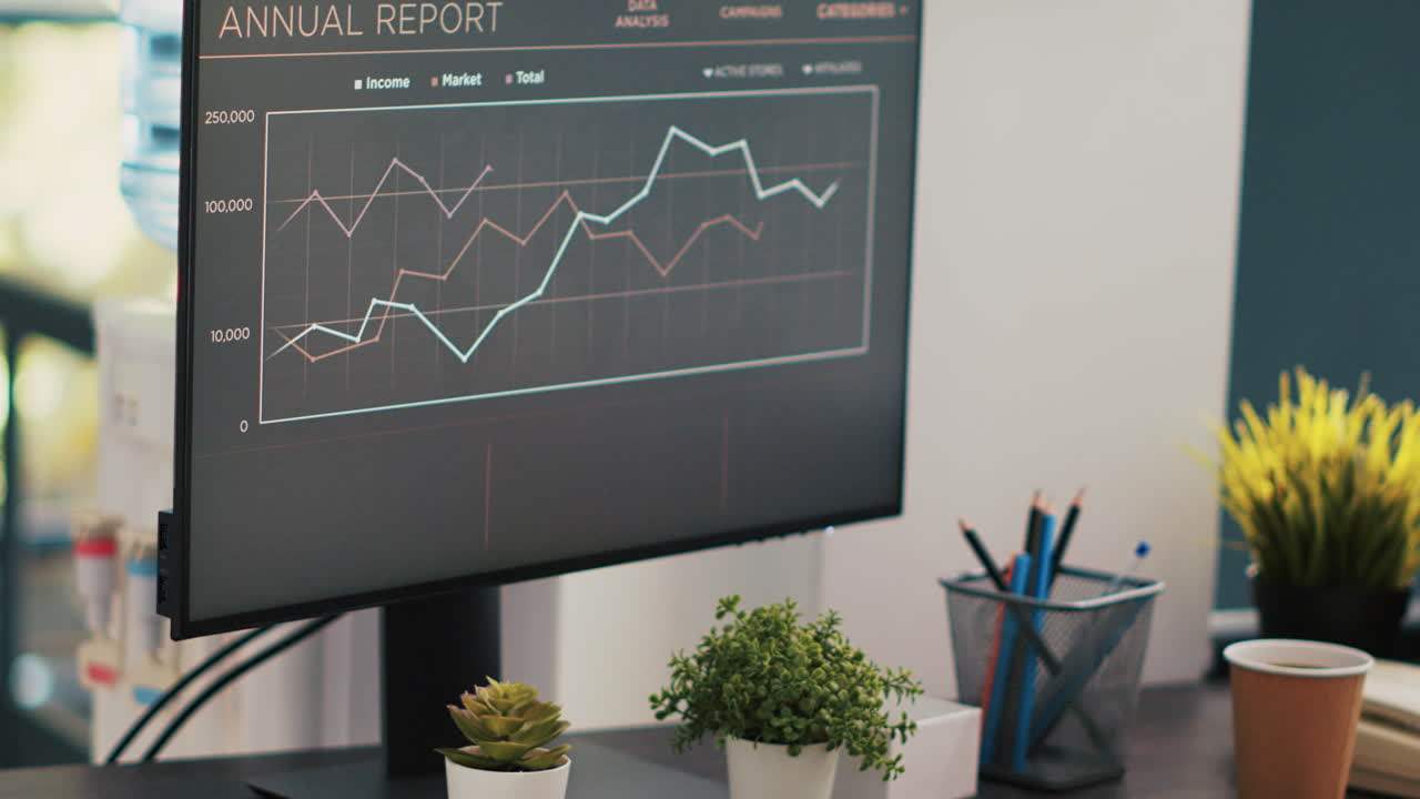 silla de ruedas y gráficos de informes económicos en el cuaderno en la oficina de la empresa inclusiva