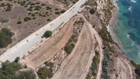 Aerial-drone-video-from-eastern-Malta,-Marsaxlokk-area,-Il-Hofra-l-Kbira-bay