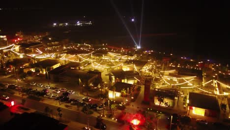 night aerial view of illuminated desert city market