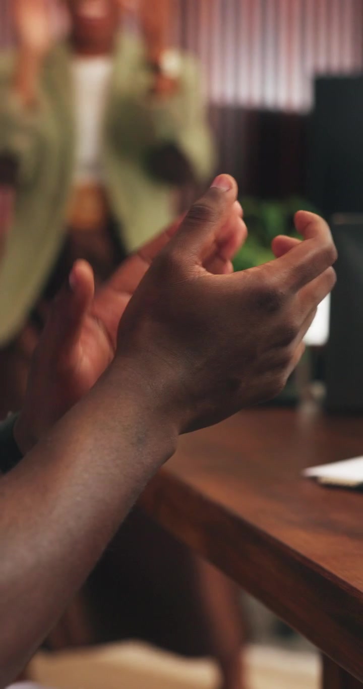 Business Colleagues Clapping Hands in Office Meeting