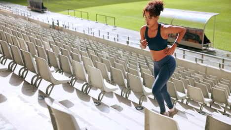 woman running in stadium