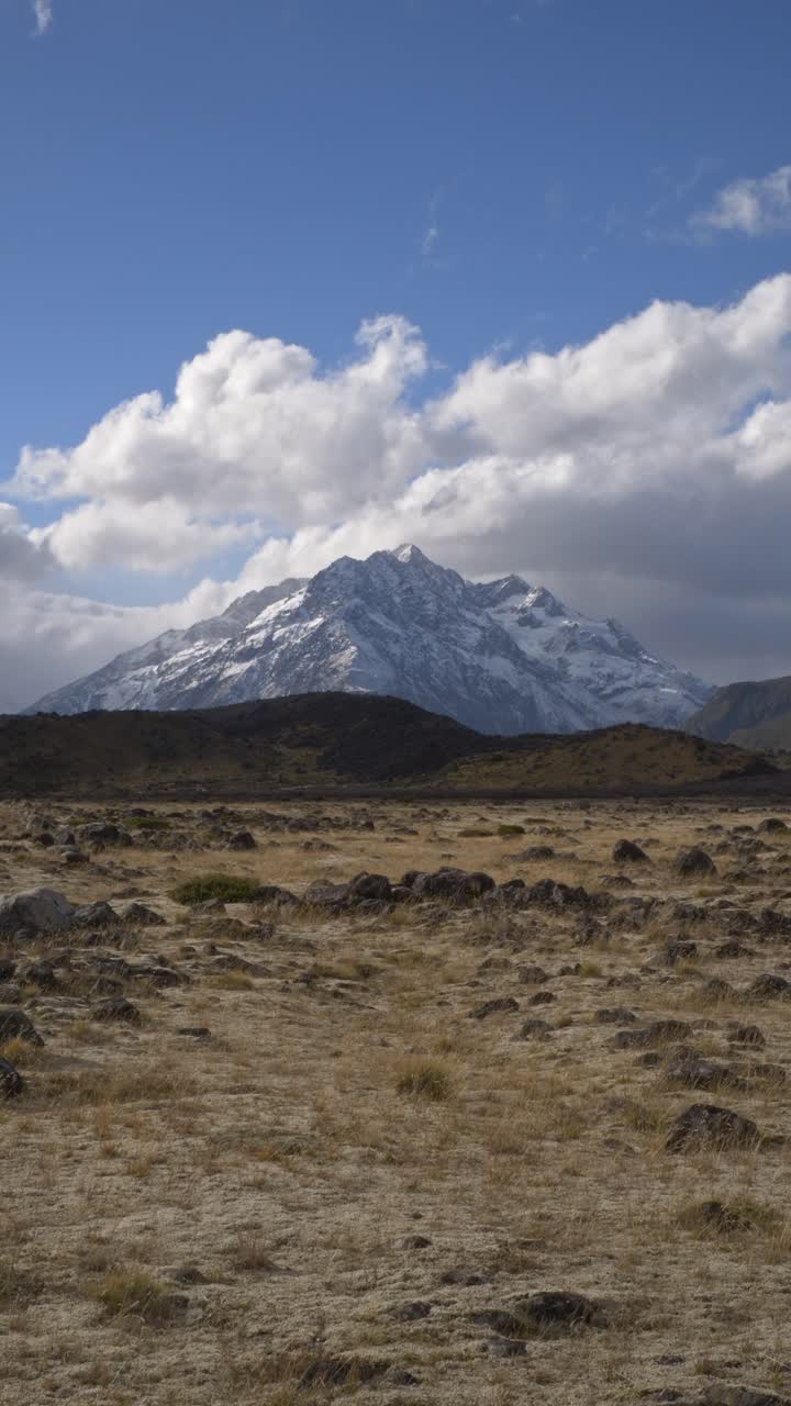 Mount Cook Against Blue Sky And Clouds In South Island, New Zealand - Vertical Shot