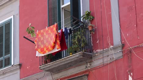 clothes drying on a balcony in naples, italy