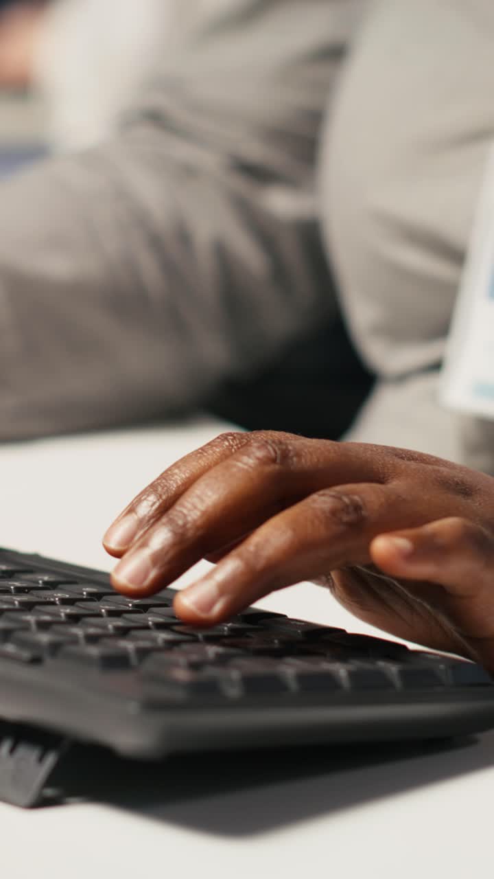 Vertical video Close up of data center admin coding, writing script on PC