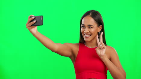 green screen, selfie and woman with a peace sign