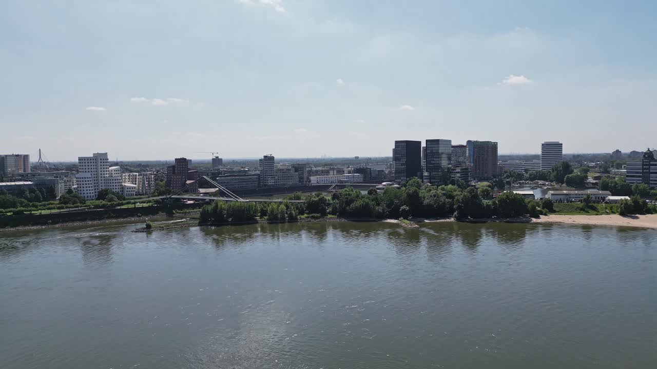 Still water of the Rhine and the imposing city of D&uuml;sseldorf, aerial