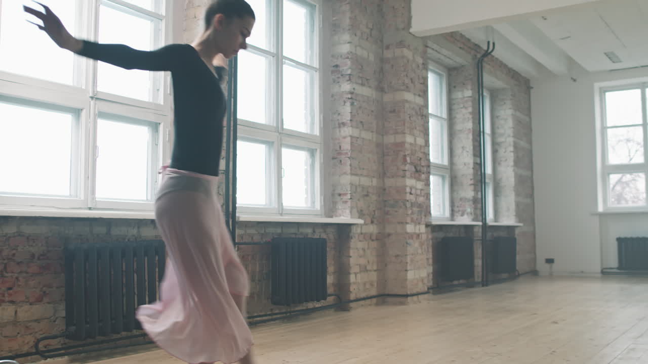 Ballerina Performing Solo Dance In Class