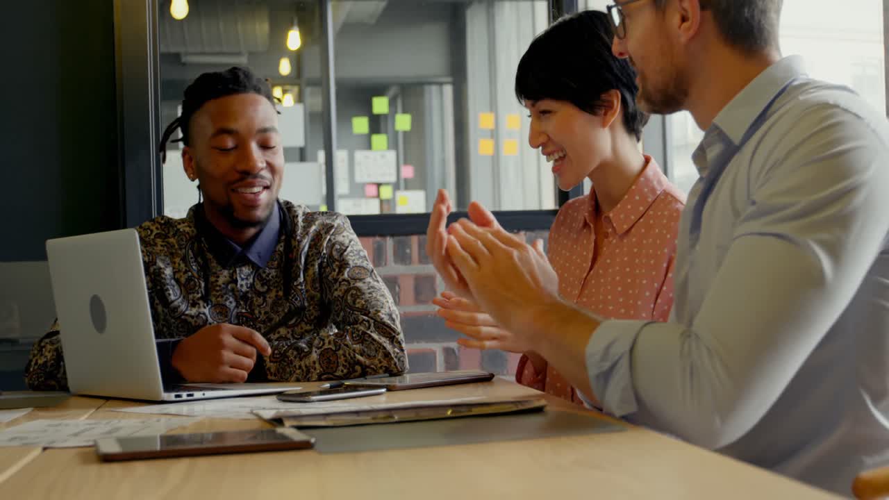 Business executives applauding in meeting 4k
