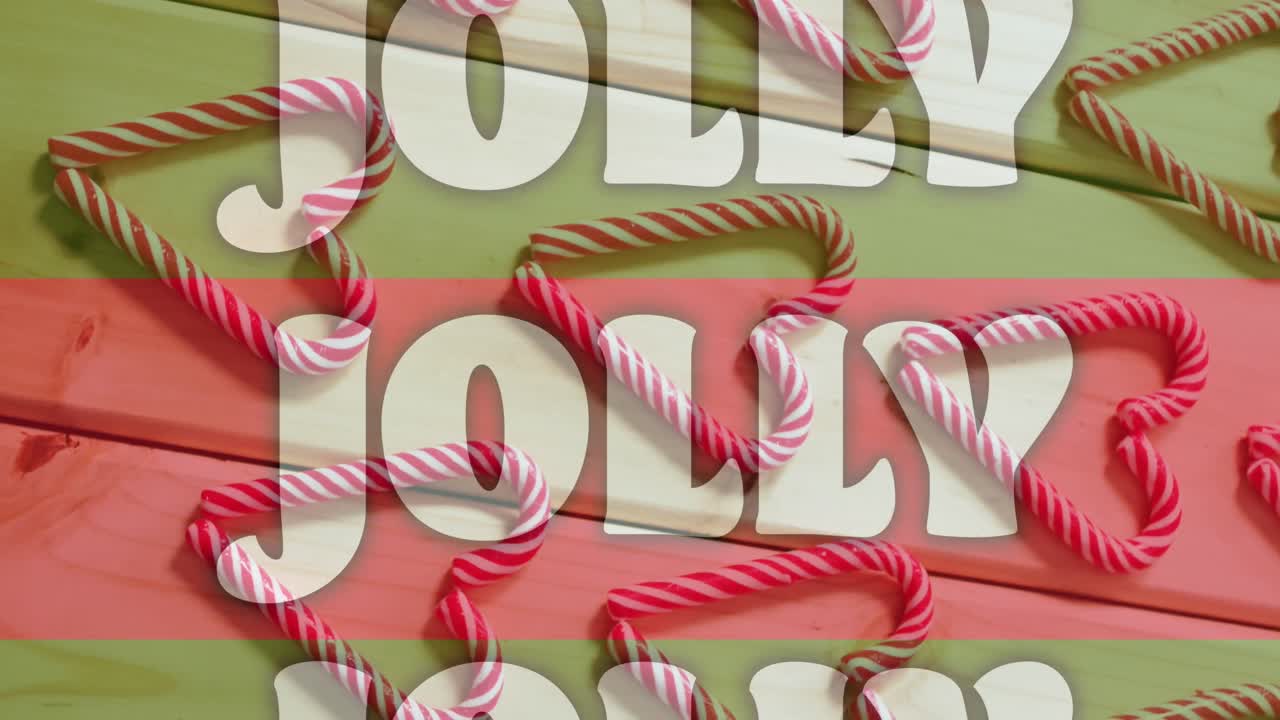 Animasi teks ceria di atas garis-garis merah dan hijau dengan permen tongkat Natal.