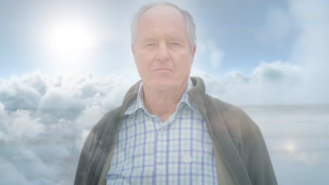 animación de luz brillante sobre un hombre mayor serio sobre las nubes