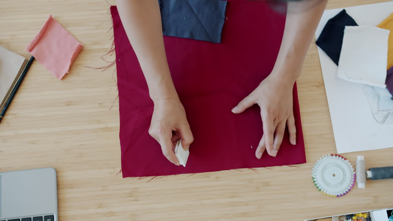 Fashion Designer Working on a Pattern