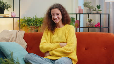 child girl laughing out loud after hearing ridiculous anecdote funny joke feeling carefree amused