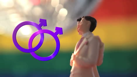 dos símbolos masculinos unidos y figuras masculinas con bola de discoteca