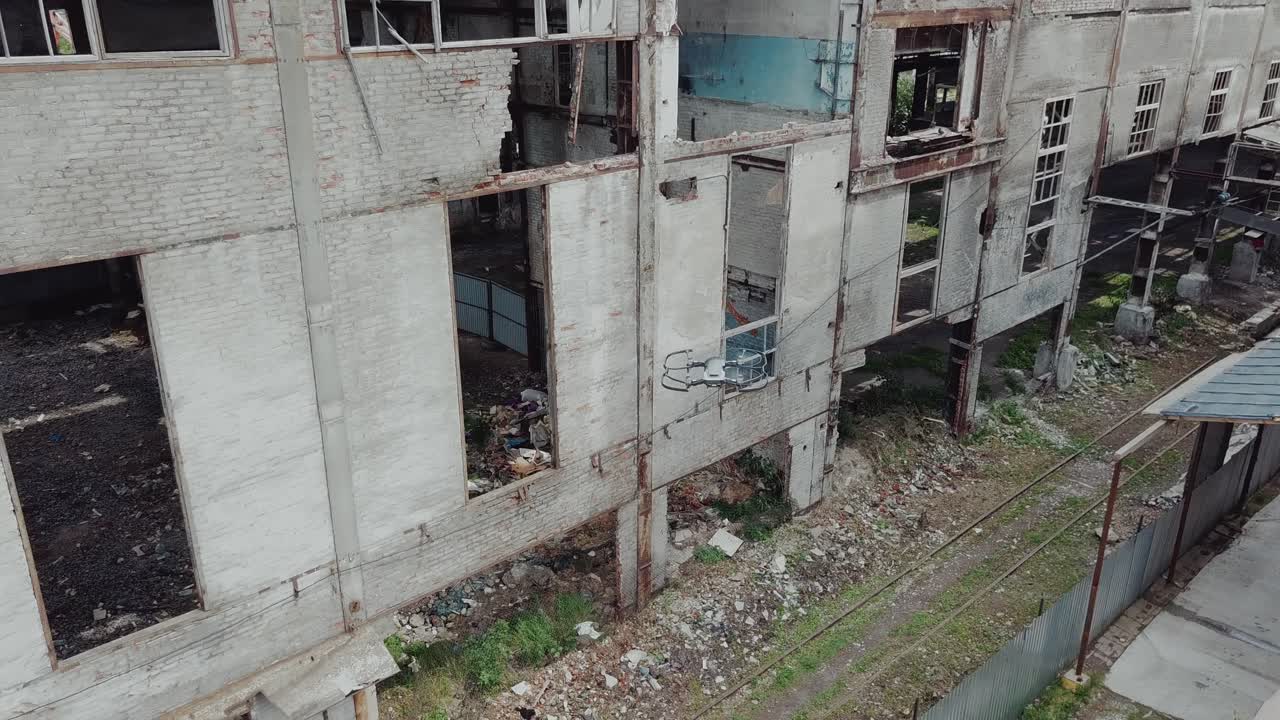 Drone view of an abandoned industrial sites. Factory ruins.