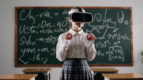 young girl in a classroom using a vr headset for virtual learning