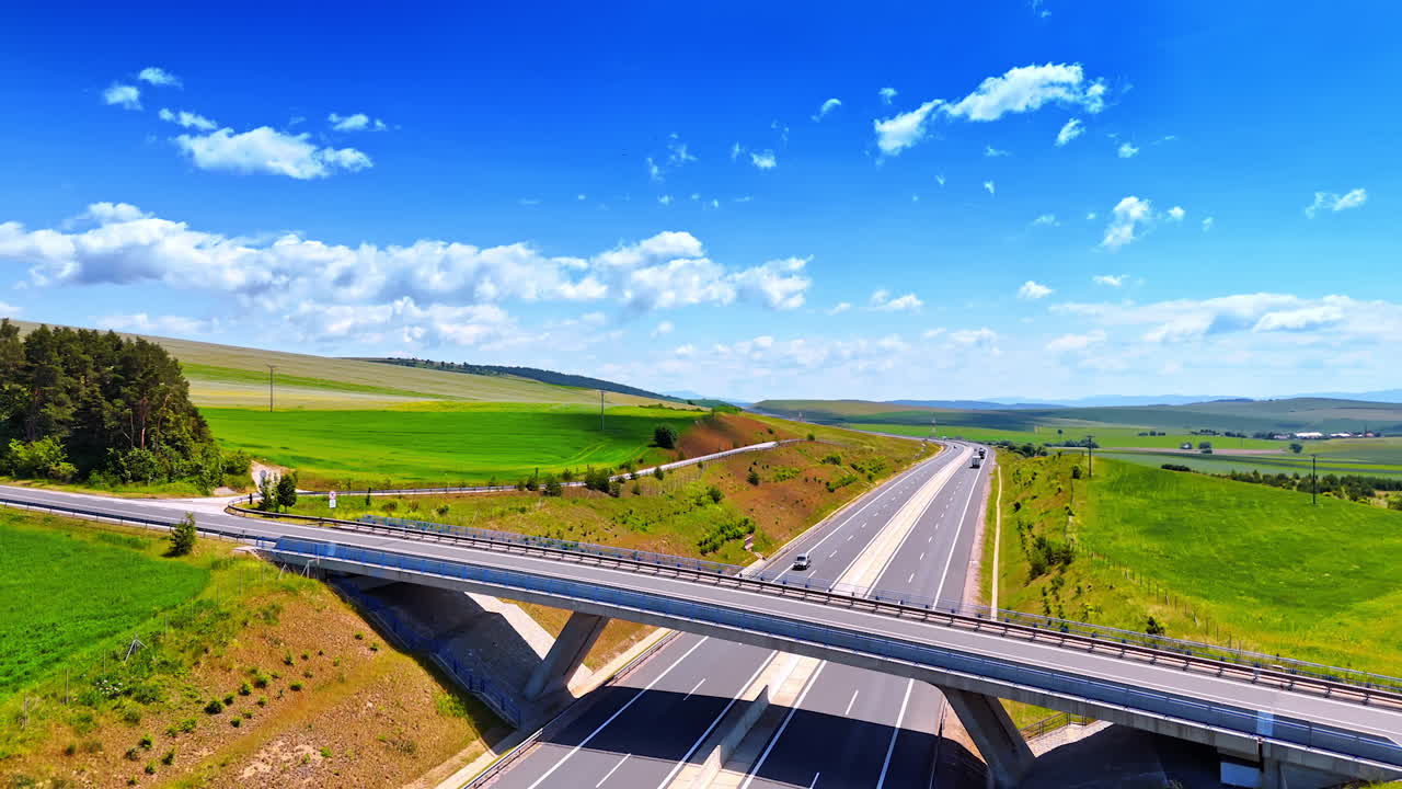 Traffic by the highways away from the big cities. Roads in the beautiful countryside of Slovakia. Aerial view