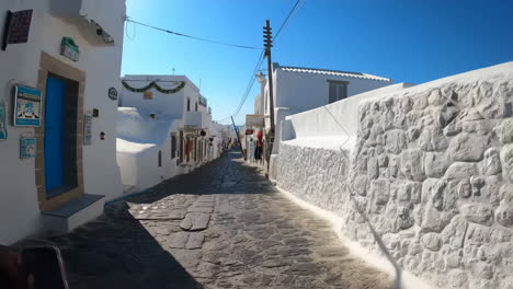 Charming Cobblestone Alleyway in a Traditional Greek Island Town