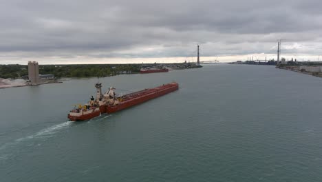 drone view of large tanker in the detroit river in detroit, michigan