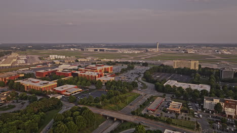atlanta georgia aerial v963 establishing drone flyover hapeville capturing hartsfield international airport featuring delta world hq campus ground at sunset - shot with mavic 3 pro cine - june 2023